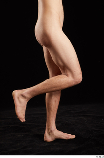 Gruffydd  1 calf flexing nude side view 0002.jpg